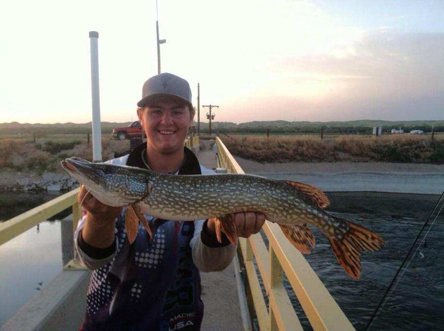 Spencer Freehling shows off a nice catch using one of his Liv N Life lures.