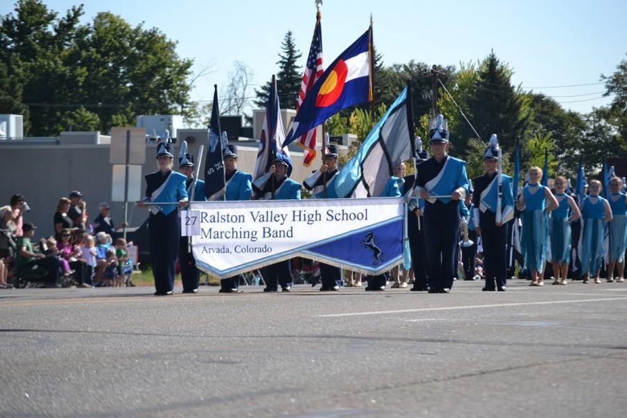 RVs marching band takes its turn down Ralston Road during the Harvest Festival.