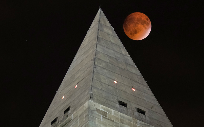 The so-called Super Moon passes beyond the peak of the Washington Monument in our nations capital. This type of eclipse wont happen again until the year 2033.