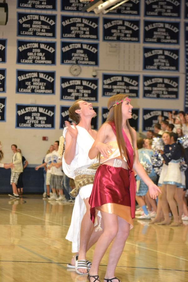 Ben Gillespie (16) and Holly Booton (16) lead the senior class in the RV Tribal Dance during Thursdays Homecoming Assembly.
