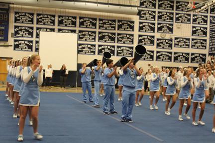 The RV Cheer Team performs at this years Homecoming Assembly earlier this year. The squad recently returned from Nationals, earning a 6th Place finish at the event.