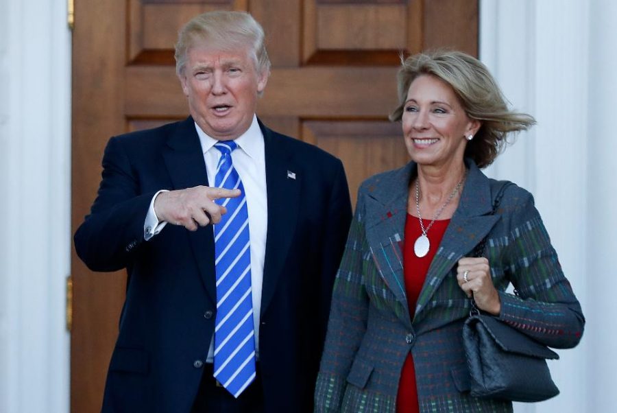 President Donald J. Trump walks side by side with Secretary of Education, Betsy DeVos. The senate confirmed DeVos to the post after Vice President Mike Pence broke the Senate deadlock with his vote to confirm her nomination.