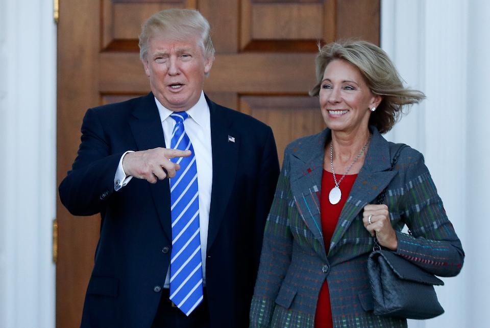 President Donald J. Trump walks side by side with Secretary of Education, Betsy DeVos. The senate confirmed DeVos to the post after Vice President Mike Pence broke the Senate deadlock with his vote to confirm her nomination.