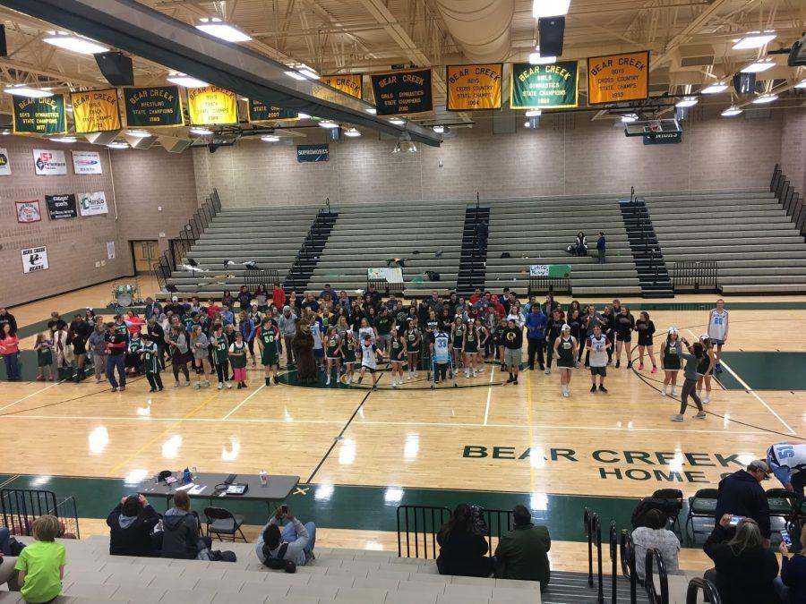 The+Ralston+Valley+and+Bear+Creek+Unified+Basketball+Teams+get+together+at+halftime+to+show+support+for+one+another+and+to+celebrate+the+game.