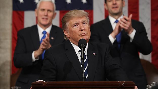 US President Donald J. Trump reacts after delivering his first address to a joint session of Congress from the floor of the House of Representatives in Washington, DC, USA, 28 February 2017.