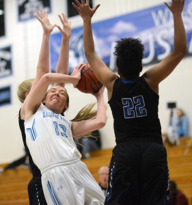 Ralston Valley senior Delaynie Byrne (18) battles inside during the Mustangs season-opening setback against Grandview, the top-ranked team in Colorado and the defending Class 5A state champions. Byrne led RV with 26 points in the game.