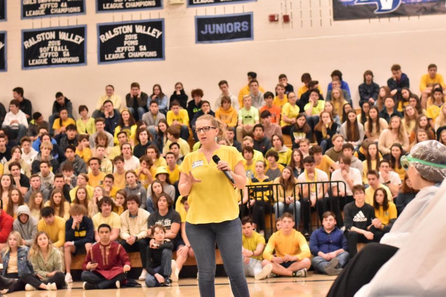 Alexa's mom shares her story as students listen attentively.